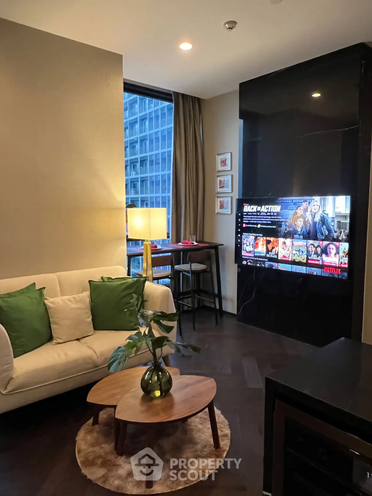 Modern living room with city view and stylish decor