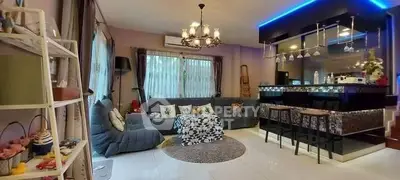 Stylish living room with modern bar and cozy seating area