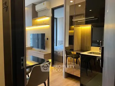 Modern apartment interior with sleek design and built-in furniture
