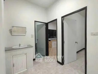 Spacious bathroom with modern fixtures and neutral tones