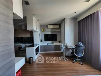 Modern living room with sleek furniture and integrated workspace