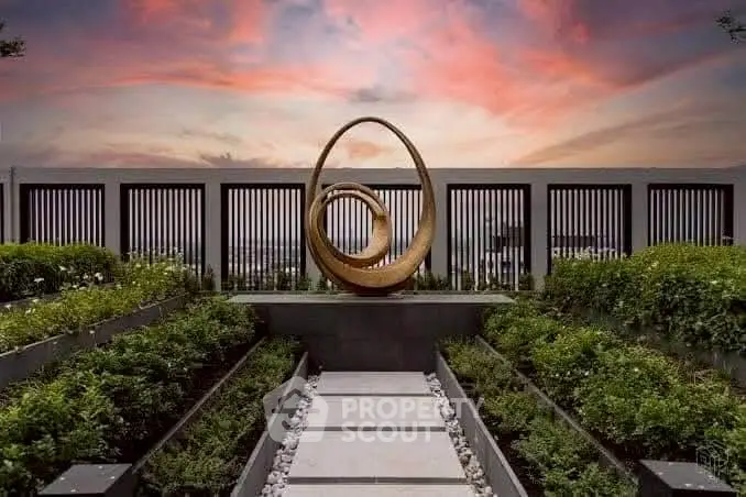 Luxurious garden with modern sculpture and stunning sunset view