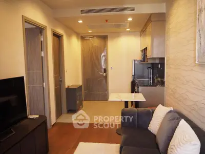 Modern living room with open kitchen in stylish apartment
