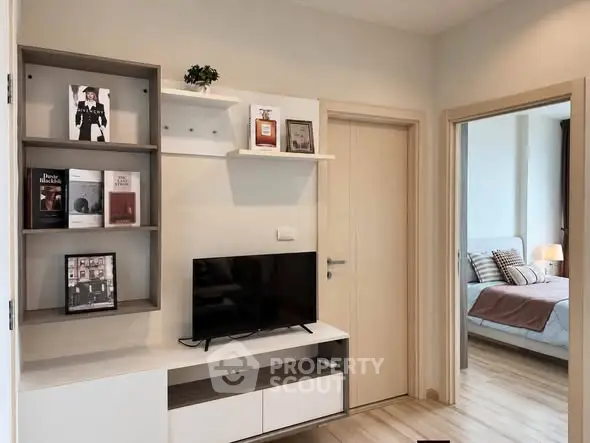 Modern apartment interior with stylish living room and cozy bedroom view