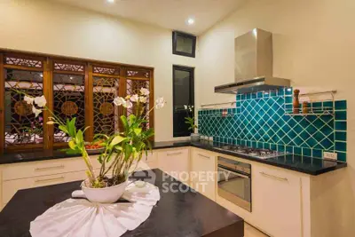 Charming kitchen with modern appliances and elegant tile backsplash