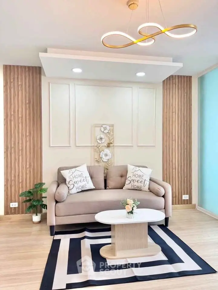 Stylish living room with modern decor, cozy sofa, and elegant lighting in a contemporary home.