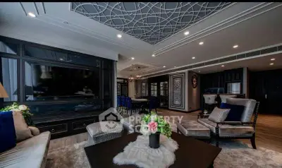 Luxurious living room with elegant decor and spacious seating area, perfect for entertaining guests.