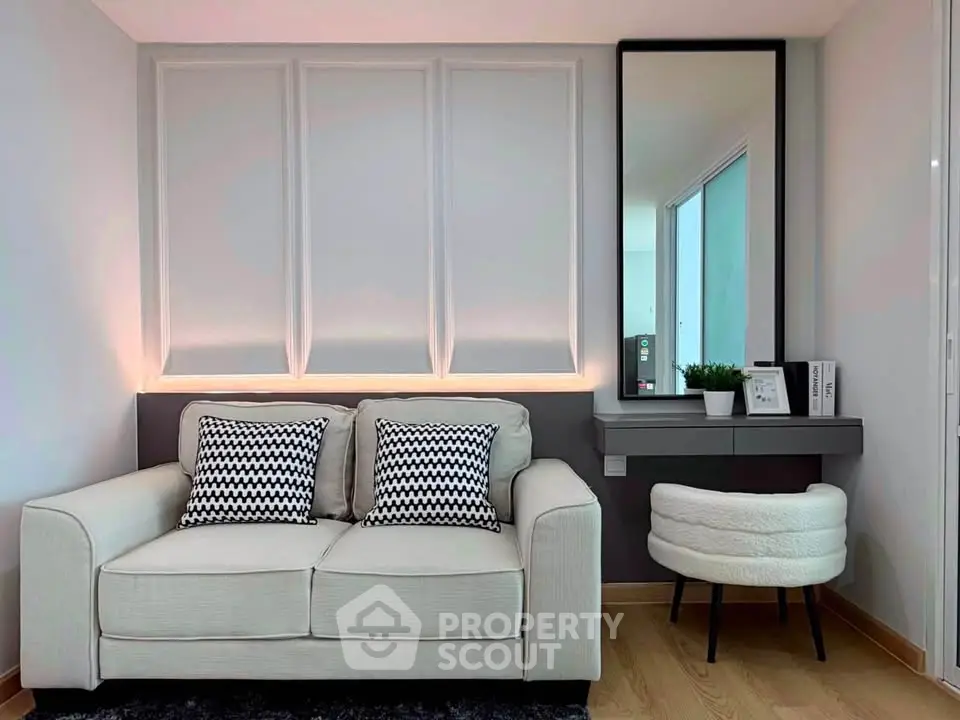 Modern living room with stylish sofa and chic decor, perfect for urban living.