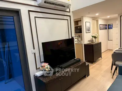 Modern living room with sleek TV setup and elegant decor
