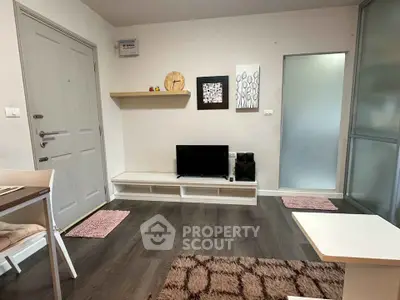 Cozy living room with modern decor and sleek flooring