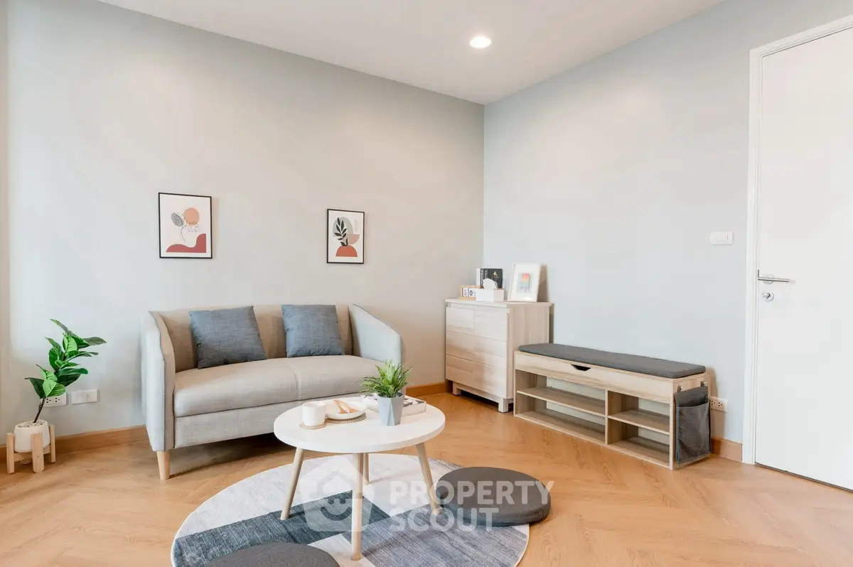 Modern living room with stylish decor and cozy seating area.