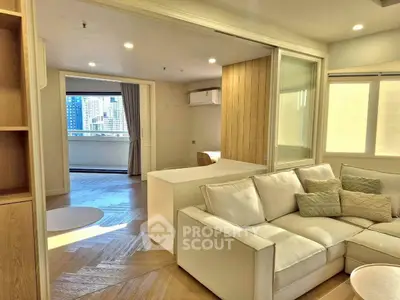 Spacious modern living room with city view and elegant decor