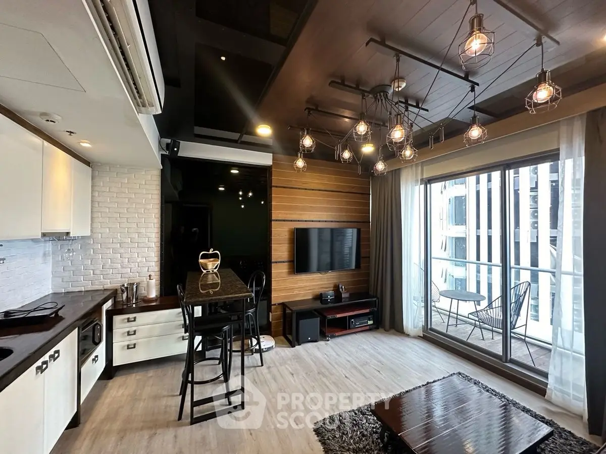Modern living room with stylish lighting and balcony view in urban apartment.