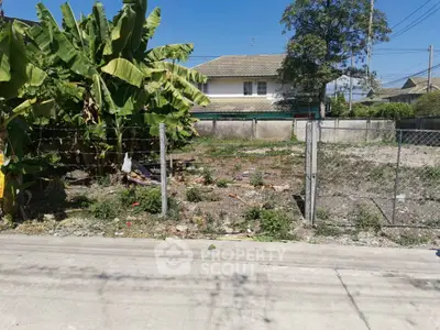 Vacant land plot with potential for development in suburban neighborhood