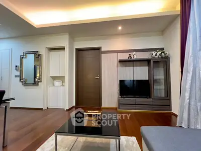 Modern living room with stylish furniture and wooden flooring