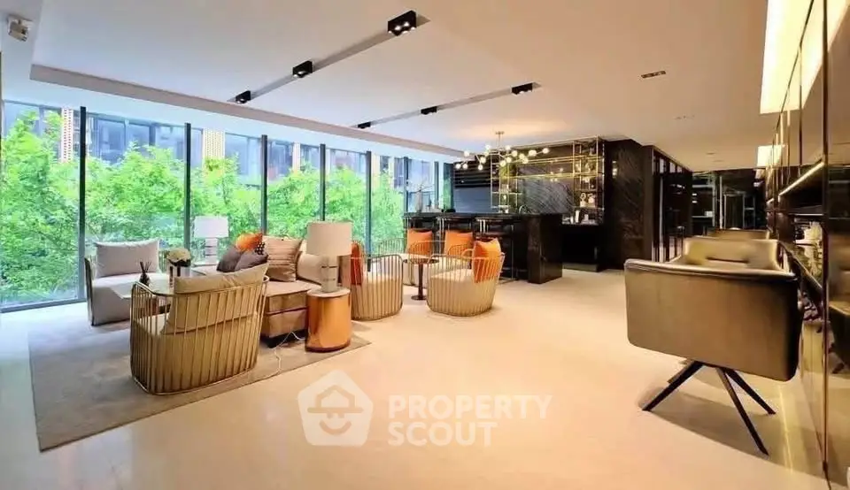 Luxurious modern living room with floor-to-ceiling windows and stylish furniture
