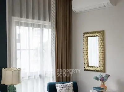 Elegant living room corner with stylish decor and natural light