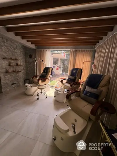 Luxurious spa room with massage chairs and serene ambiance