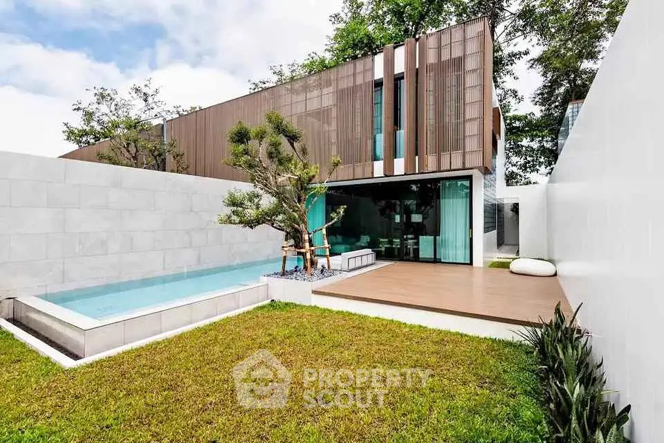 Modern luxury home with sleek design, private pool, and lush garden for ultimate relaxation.