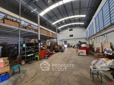 Spacious industrial warehouse with high ceilings and ample storage space
