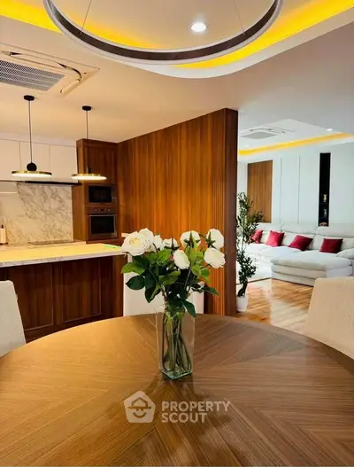 Luxurious open-plan living room with elegant kitchen and stylish decor