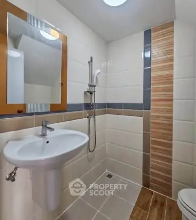 Modern bathroom with sleek fixtures and stylish tile design