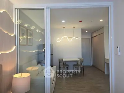 Modern apartment interior with stylish lighting and open layout