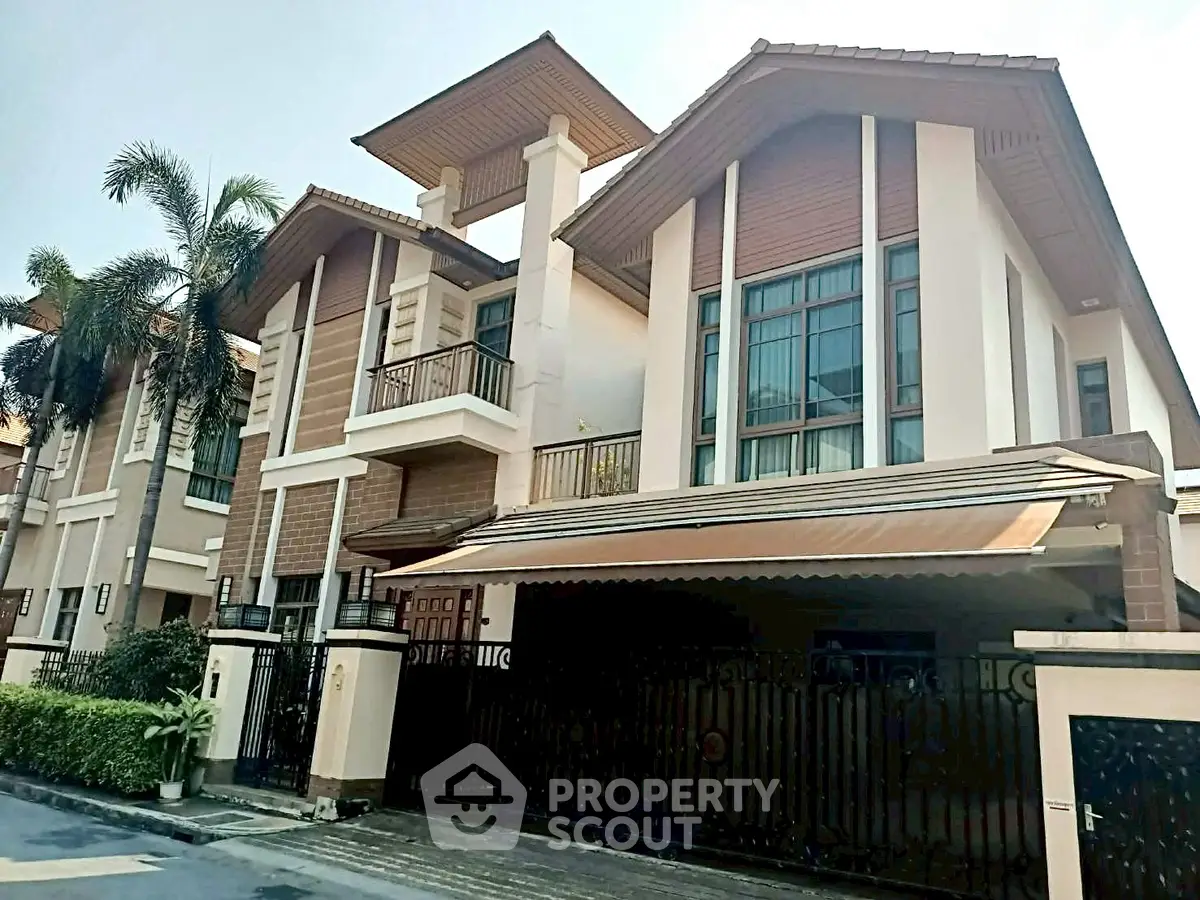 Stunning modern villa with elegant architecture and spacious balconies in a serene neighborhood.