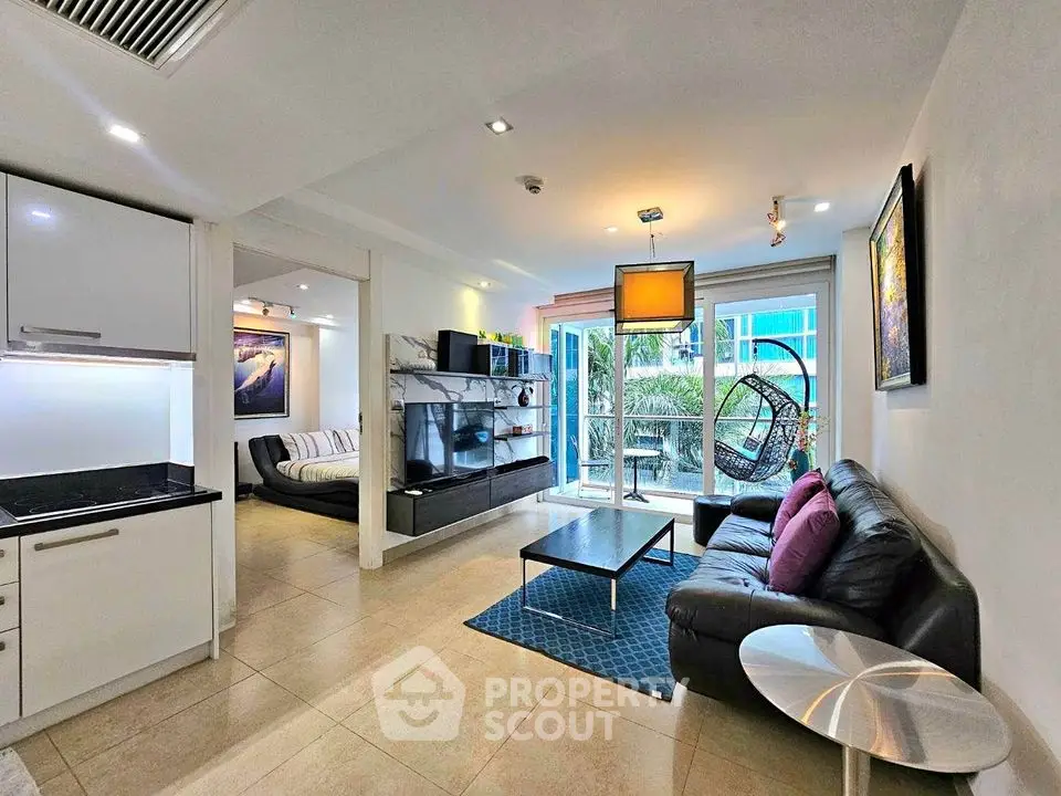Modern living room with sleek furniture and balcony view in luxury apartment