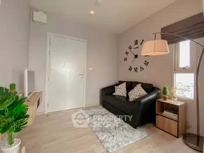 Cozy living room with modern decor and stylish wall clock