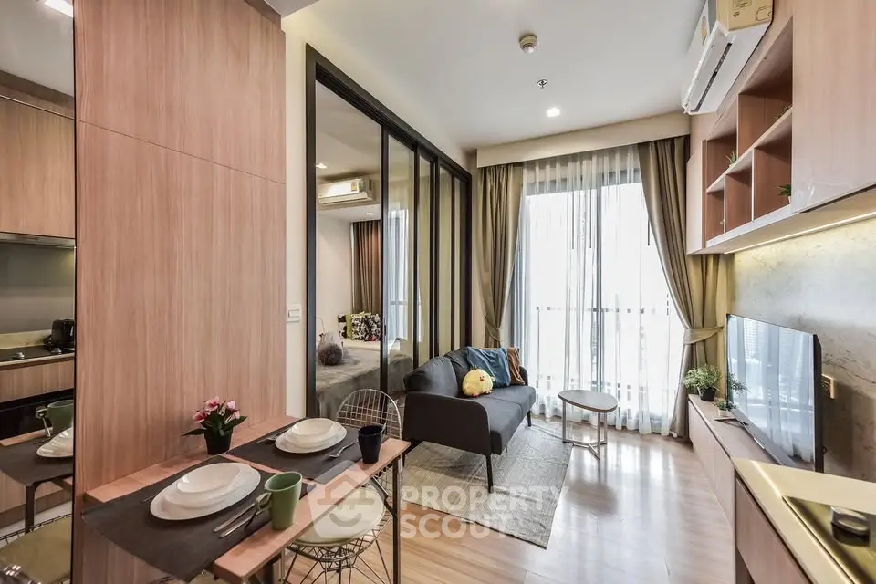 Modern living room with open layout and stylish decor in a cozy apartment