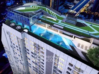 Stunning rooftop pool and garden on modern high-rise building with city views.