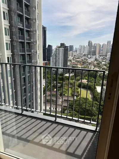 Stunning cityscape view from a high-rise balcony, perfect for urban living enthusiasts.