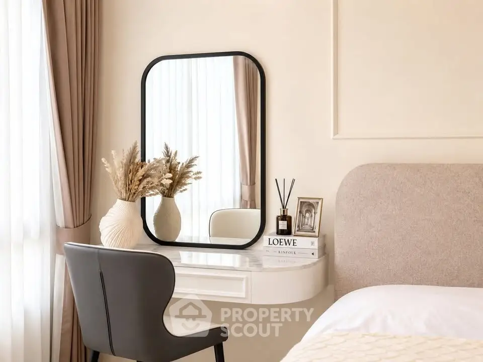 Elegant bedroom with stylish vanity, mirror, and cozy decor