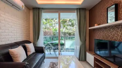 Modern living room with balcony view and stylish decor