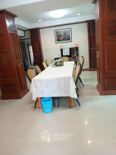 Elegant dining area with wooden accents and modern decor