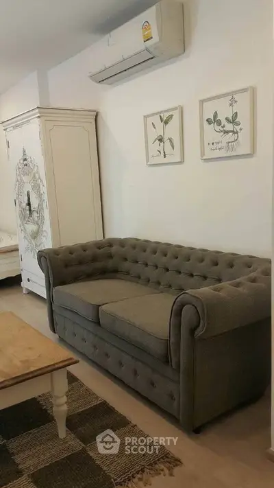 Charming living room with elegant sofa and vintage decor