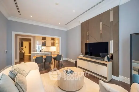 Luxurious open-plan living room with modern kitchen and elegant decor