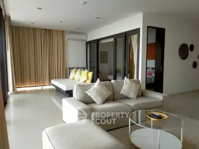 Spacious modern living room with elegant decor and natural light