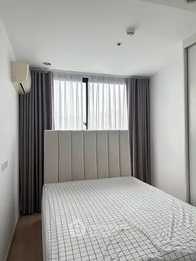 Modern bedroom with minimalist design and natural light