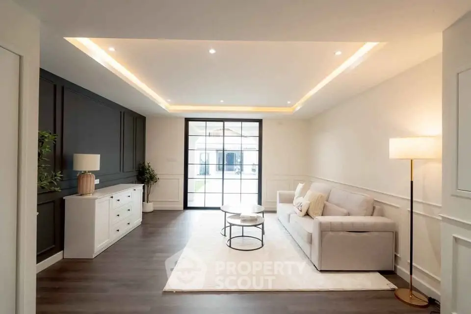 Modern living room with elegant lighting and stylish furniture