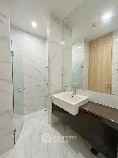Modern bathroom with sleek design and elegant marble tiles