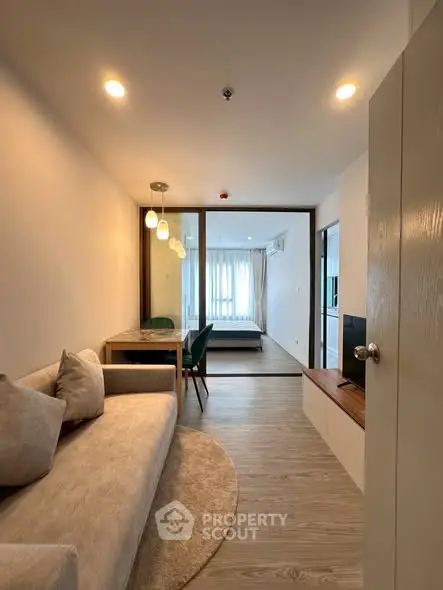 Modern apartment interior with cozy living area and stylish bedroom