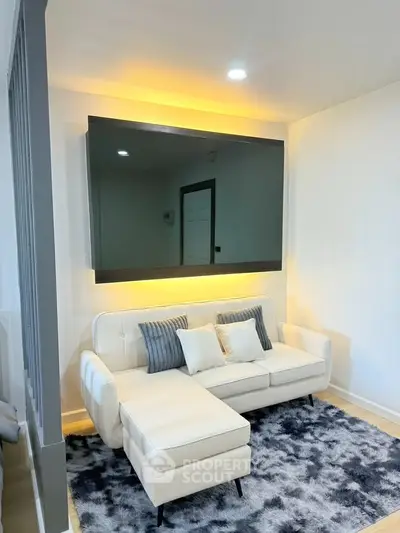 Modern living room with stylish white sofa and ambient lighting