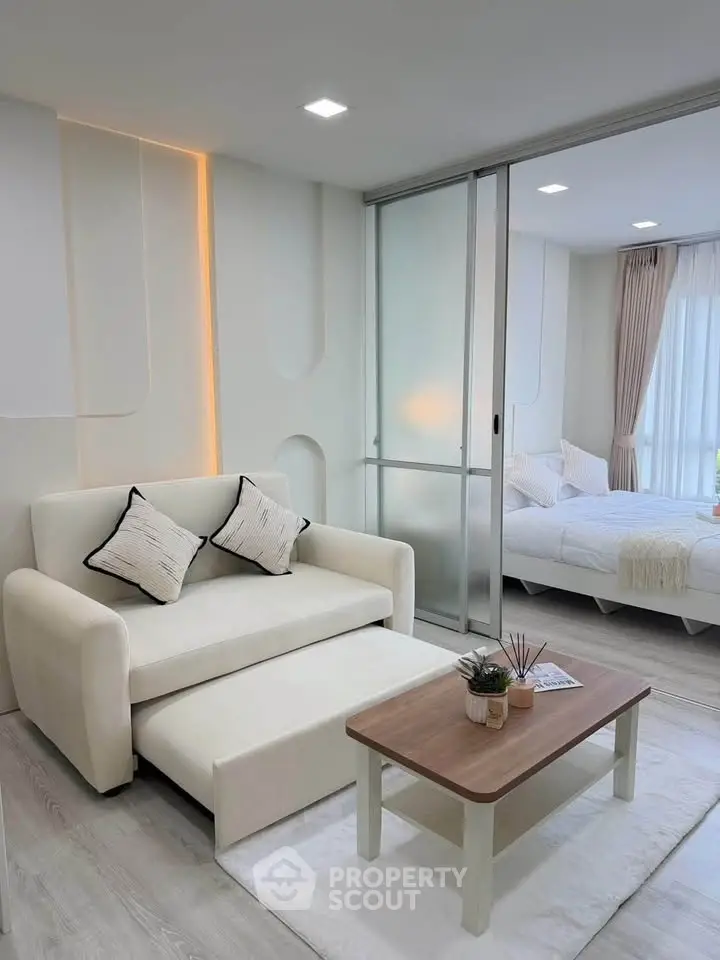 Modern living room with cozy sofa and stylish decor in a bright apartment