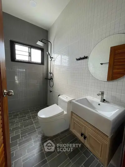 Modern bathroom with sleek fixtures and stylish tile design