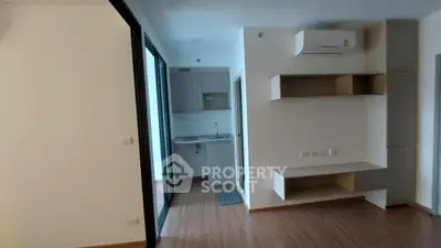 Modern apartment interior with open kitchen and air conditioning