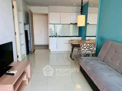 Modern living room with open kitchen and stylish decor