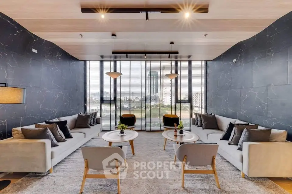 Luxurious modern living room with panoramic city view, elegant furniture, and stylish decor.