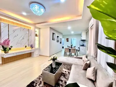 Luxurious modern living room with elegant decor and open kitchen layout